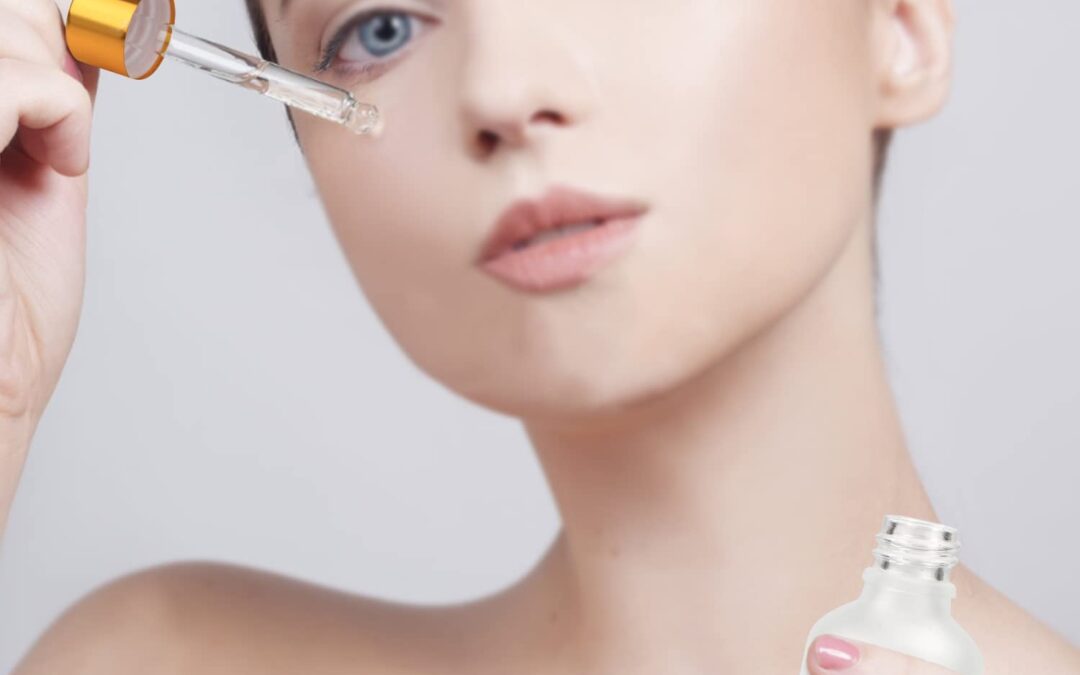 model woman with frosted glass dropper bottle